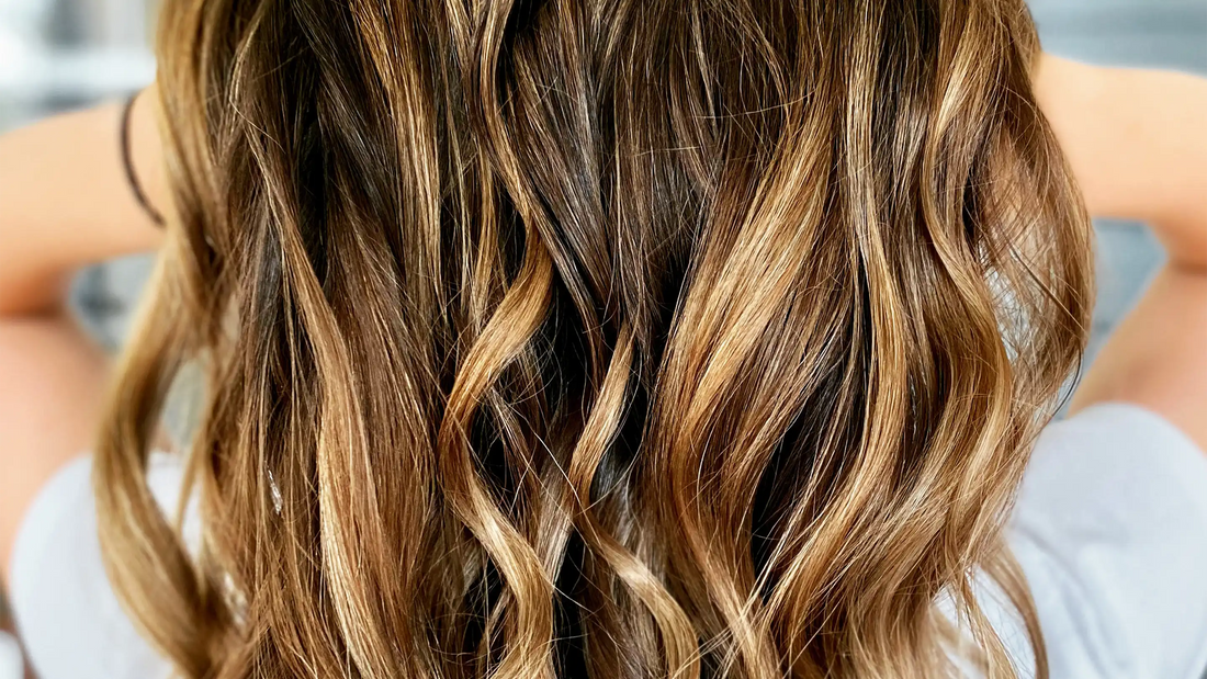 Woman showing off her balayage hair style