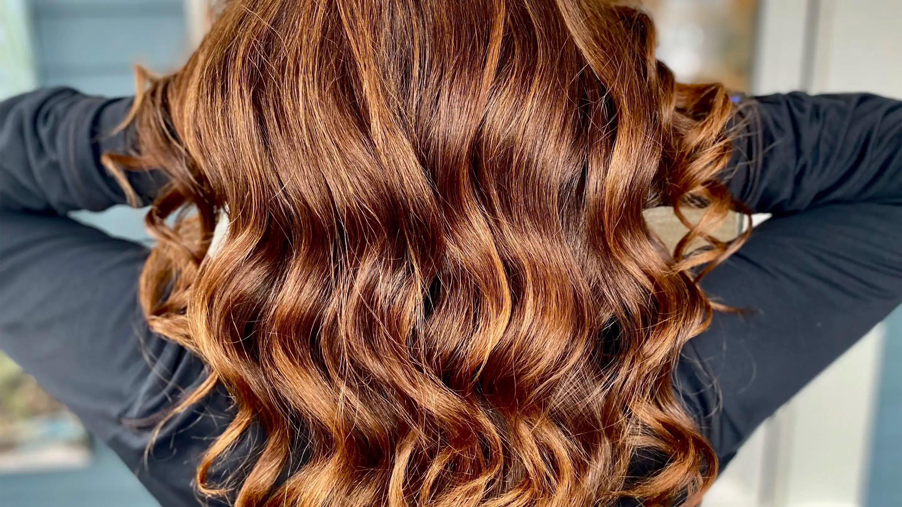 Woman showing off her fresh coloured hair